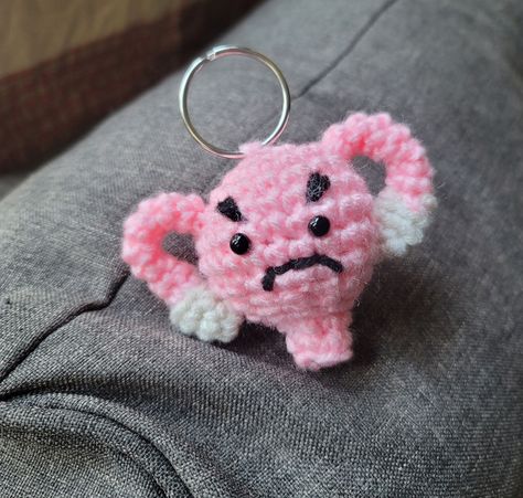 Angry Uterus Keychain - FREE Crochet Pattern Crochet Uterus Keychain, Uterus Amigurumi Pattern Free, Bacteria Crochet Pattern, Angry Uterus Crochet Pattern, Uterus Crochet Pattern Free, Crochet Uterus Pattern, Crochet Badge Reel Pattern, Crochet Creepy Amigurumi, Cute Small Crochet Animals