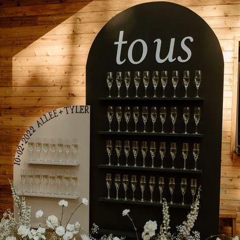 Arched Shelving Displays: Two piece display wall. Small taupe and larger black rouded 8 ft wall both adorned with shelving. Layer or use seperatly. Welcome guests with champagne or use as an escort card display. Peices do not come with lettering or glasses bu can do custom lettering upon request. Arched Shelving, Candy Wall, Champagne Wall, April Wedding, Display Wall, Card Display, Lounge Seating, Farm Table, Custom Letters