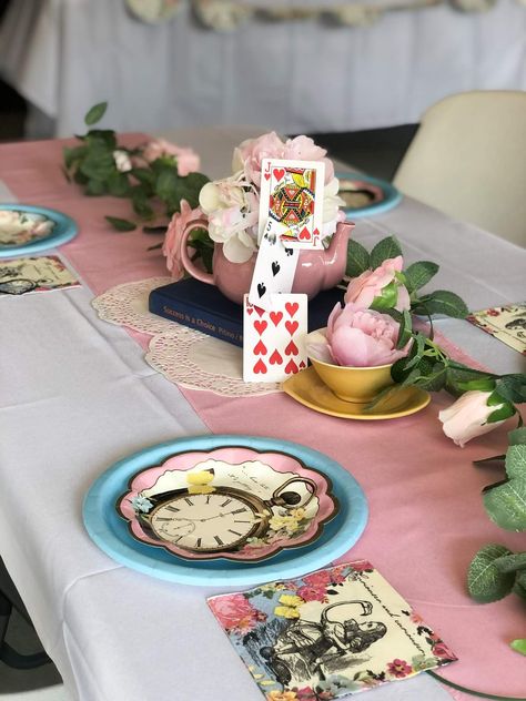 Della In Onederland 1st Birthday | CatchMyParty.com Alice In Onederland First Birthday Centerpieces, Alice Wonderland Centerpieces, Alice In Onederland Centerpieces, Onederland Centerpieces, Alice In Wonderland Centerpiece Ideas, Alice In Onederland, Alice In Wonderland Birthday Party, Wonderland Birthday Party, Alice In Wonderland Tea Party Birthday