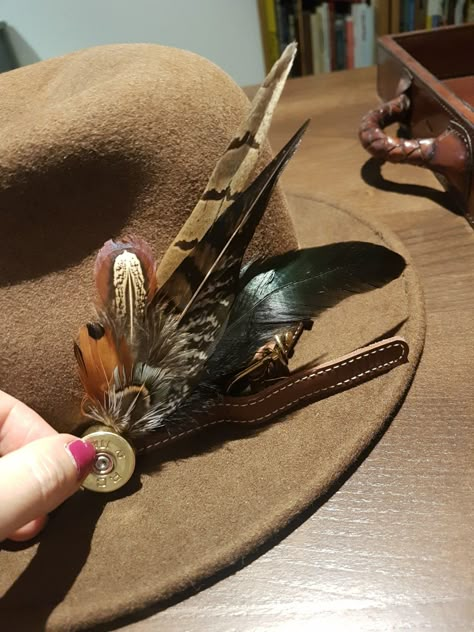 Make your own fedora feather & shot gun cartridge hatband. – Gift Horse Eventing Cowboy Hat Bands Diy, Hat Bands Diy, Hat Bands Diy Ideas, Pheasant Feather Decor, Horse Eventing, Shell Casings Crafts, Cowboy Hat Bands, Hat Bands, Feather Decor