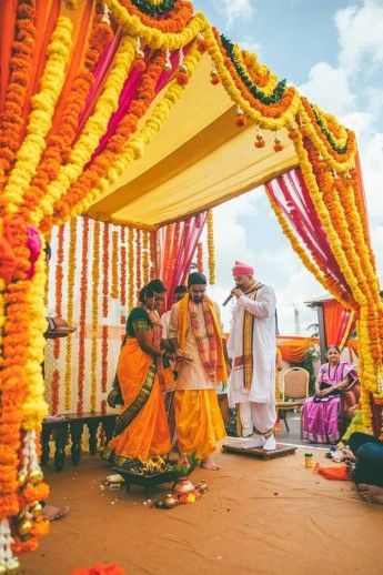 Simple Marathi Wedding in Bangalore With Lots of Sunshine & Marigolds! | WedMeGood Marathi Wedding Aesthetic, Marathi Wedding Decor, Marathi Wedding Decoration, Yellow Drapes, Mandap Design, Marathi Wedding, Matrimonial Sites, Couple Clothes, Mandap Decor