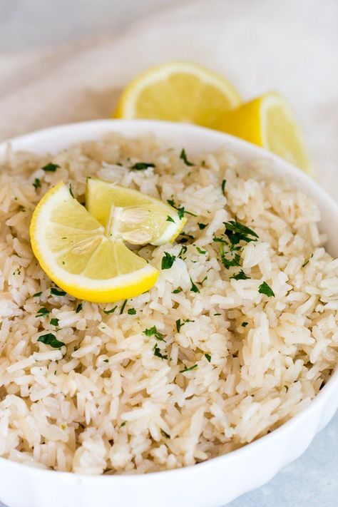 Instant Pot Lemon Rice Pilaf | Six Sisters' Stuff We're using our Instant Pot to make a quick and delicious side that your whole family will love. Instant Pot Lemon Rice Pilaf is done in 20 minutes! #instantpot #sidedish Greek Rice Recipe Instant Pot, Instapot Greek Rice, Last Minute Instant Pot Meals, Instant Pot Potluck Recipes, Instant Pot Lemon Rice, Lemon Rice Pilaf, Greek Lemon Rice Soup, Yummy Rice, Lemon Rice Soup