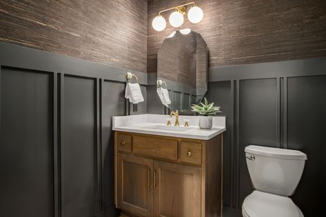 Stonewall Ranch - Farmhouse - Powder Room - Kansas City - by Top Shelf Home Builders | Houzz Powder Room With Paneling, Peppercorn Powder Room, Powder Room Wood Paneling, Wainscoting Powder Room, Powder Bathroom Ideas, Farmhouse Powder Room, Black Wainscoting, Half Bath Remodel, Ranch Farmhouse