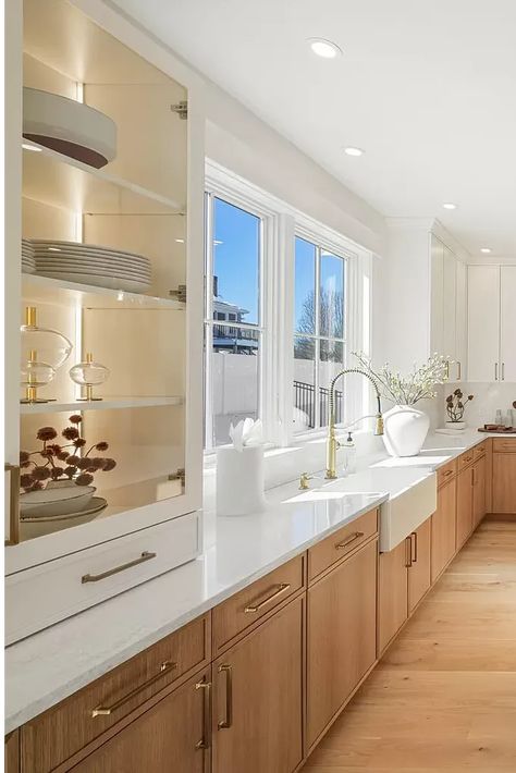 This modern kitchen features a spacious island that provides extra prep space, storage, and seating. The sleek countertops and pendant lights add a touch of sophistication.  The large windows let in natural light and make the space feel open and airy. #kitchen #kitchendesign #kitchenisland #modernkitchen #interiordesign #homedesign #dreamkitchen #kitchendecor #storage #seating #pendantlights #windows #naturallight #openfloorplan #bhghome #houzz #kitchengoals #instahome #luxurykitchen Kitchen With Large Island, Storage And Seating, Storage Seating, Airy Kitchen, Elegant Kitchen Design, Kitchen Magic, Rustic Modern Kitchen, Space Storage, Coastal Kitchen