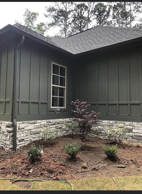 Green Siding Tan Trim, Dark Gray Vertical Siding Exterior, Green Vertical Siding Exterior, Charcoal Green Exterior House, Dark Gray Green Exterior Paint Colors, Dark Green Exterior Paint Colors, Dark Grey Green House Exterior, Evergreen House Exterior, Dark Green Craftsman Exterior