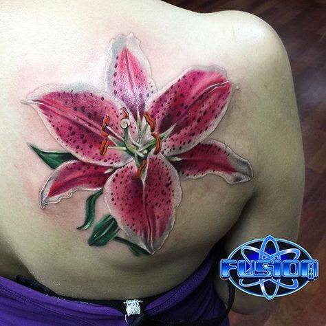 Nice little star gazer lily in progress I started the other day, still got some tightening up to do and background left but it's coming along all done with @fusion_ink @inkjecta @hushanesthetic @stencilanchored @rinsecup Stargazer Lily Tattoo, Natural Skin Tightening, Lillies Tattoo, Evil Tattoo, Fusion Ink, Calf Sleeve, Proper Skin Care, Lily Tattoo, Stargazer Lily