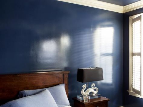 Bring a touch of high style to bedroom walls with a wet effect glossy paint application. Dark Blue Walls, Painting Wood Furniture, Glossy Paint, High Gloss Paint, Painting Bathroom, Blue Walls, Wall Paint, Interior Paint, Interior Walls