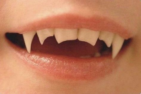 Peachy lips with two sets of fangs and sharped front teeth Sharp Fangs Aesthetic, Permanent Vampire Fangs, Vampire Aesthetic Fashion, Double Fangs, Vamp Teeth, Angel Fangs, Werewolf Teeth, Vampire Mouth, Vampire Eyes