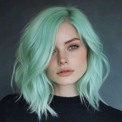 20 Dynamic Mint Green Hairstyles to Inspire Your Next Look - Hair Guru Mint Green Hair Color, Green Hairstyles, Pastel Green Hair, Angular Bob, Green Hair Color, White Blonde Highlights, Mint Green Hair, Retro Curls, Messy Bun With Braid