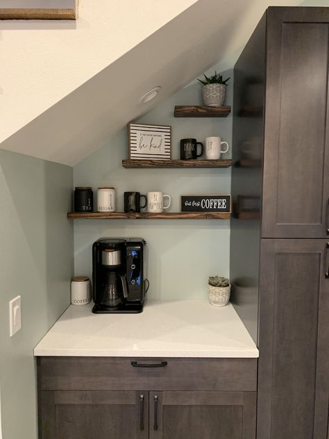 Under the stairs coffee corner. Shelves by Dakoda Love company!! Coffee Bar Ideas Under Stairs, Coffee Station Under Stairs, Under The Stairs Coffee Bar, Coffee Corner Under Stairs, Under Stair Coffee Bar, Coffee Nook Under Stairs, Coffee Corner Shelves, Kitchen Design Under Stairs, Under Stairs Coffee Bar