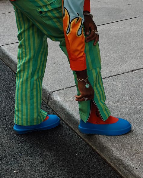 Walking flames 🔥 . . . Men’s streetwear style, colorful outfits, soho New York, baggy pants, men’s fashion, street style #streetweardaily #streetwear #ootd #sohonyc #streetstyle #mensfashion #outfitinspiration #inspofashion Orange And Blue Streetwear, Summer Streetwear Patchwork Jeans, Orange Cotton Pants For Streetwear, Playful Multicolor T-shirt For Streetwear, Orange Fade-resistant Sneakers For Streetwear, Soho Nyc, Baggy Pant, Colourful Outfits, Soho