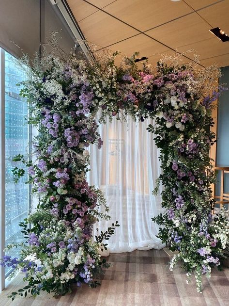 Lilac Arch Wedding, Purple Wedding Arch Ideas, Purple Floral Arch, Lilac Green Wedding, Blue And Purple Wedding Arch, Enchanted Forest Theme Backdrop, Lilac And Forest Green Wedding, Lilac Purple Wedding Theme, Lilac And Green Wedding