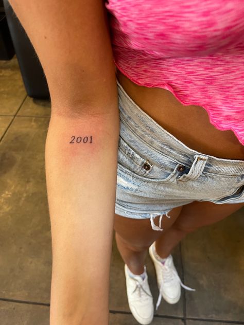 Simple Tatoos Arms, Forearm Year Tattoo, Small 2003 Tattoos, Small 2005 Tattoos, Red 2001 Tattoo, Small Tattoos Year, Birth Year Tattoo Placement Ideas, Dainty Tattoos Year, Number Tattoos On Arm