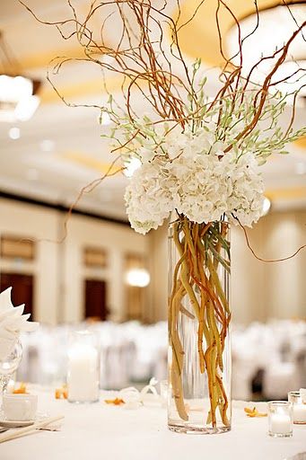 Tall centerpiece arrangement with hydrangeas, dendrobium orchids and curly willow. Branch Centerpieces Wedding, Centerpieces Simple, Wedding Branches, Curly Willow, White Hydrangeas, Willow Branches, White Hydrangea, Mother Son, Deco Floral