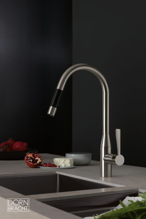 The SYNC faucet features a downward pull-out spout and a single-lever mixer with spray function. #kitchenfaucet Medium Kitchen, Wall Cupboards, Kitchen Company, High End Kitchens, Kitchen Mixer Taps, Kitchen Mixer, Utility Rooms, Kitchen Fittings, Kitchen Makeover