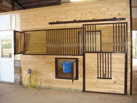 Sliding stall door with swing out hay feeder, swing out water bucket holder and drop down door opening. Talk about convenient!  #cee #dreambarn #equine #horsestalls #besthorsestalls Planning 2024, Barn Remodel, Barn Layout, Horse Farm Ideas, Stable Style, Stall Fronts, Barn Hacks, Horse Barn Ideas Stables, Barn Stalls