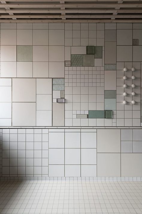 Swedish design duo Folkform has installed a mural composed of over 1,000 individual glass and ceramic pieces in an indoor public swimming pool in Spånga, Stockholm. Public Art Installation, Indoor Swimming Pool, Interior Tiles, Bookcase Design, Natural Swimming Pools, Ad Magazine, Indoor Swimming, Tile Murals, Indoor Swimming Pools