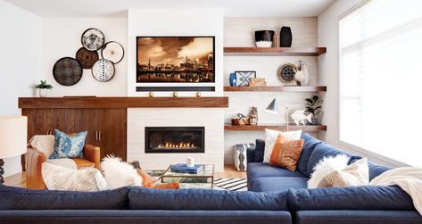 Fashion Meets Function Inside This Bloomington Remodel - Midwest Home Asymmetrical Fireplace, Asymmetrical Fireplaces, Midwest Home, Background Tile, Building Remodeling, Focal Wall, Kitchen Family Rooms, Modern Shelving, Transitional Living Rooms