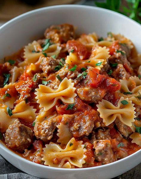 If you’re looking to indulge in a dish that captures the essence of comforting Italian cuisine, Italian Sausage with Bow Tie Pasta is a must-try. This savory and satisfying recipe ... Read more Meals With Sweet Italian Sausage, Meals With Hot Italian Sausage, Italian Sausage And Bowtie Pasta, Bob Evans Italian Sausage Recipes, Ground Italian Pork Sausage Recipes, Bow Tie Sausage Pasta, What To Make With Italian Sausage Links, Johnsville Sausage Recipes, Pasta Recipes Bowtie