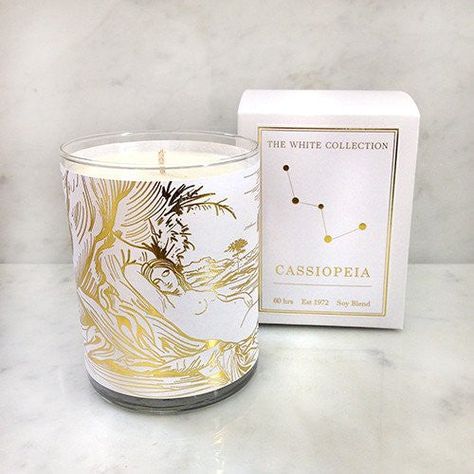 Description: Derived from Ancient Greek Astrology, each candle in Spitfire Girl's White Collection corresponds to a constellation. According to the legend, Cassiopeia was known for her vanity and boasted that she and her daughter, Andromeda, were more beautiful than the Nereids, sea nymphs. This angered the sea god Poseidon, who sent a sea monster to terrorize the kingdom. To appease Poseidon and save her people, Cassiopeia's daughter Andromeda was sacrificed, but she was ultimately rescued by t Wax Candles Ideas, Elegant Feminine Aesthetic, Greek Astrology, Scented Candles Packaging, Cassiopeia Constellation, Candle Holder Diy, Black Femininity Aesthetic, Candle Packaging Design, Candles Collection