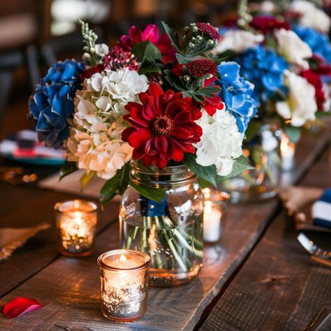 Looking for inspiration to create the perfect 4th of July tablescape? Check out these creative and festive ideas to make your Independence Day celebration unforgettable! From classic Americana to rustic charm, discover beautiful setups that incorporate red, white, and blue decor, patriotic centerpieces, and themed dinnerware. Perfect for family gatherings and backyard barbecues, these tablescape ideas will add a touch of patriotic spirit and style to your holiday. Red White Blue And Gold Wedding, 4th Of July Wedding Decorations, Red White And Blue Floral Arrangements, July 4th Wedding Ideas, Red White And Blue Wedding Theme, Red White And Blue Centerpieces, Red And White Wedding Decorations, Red Table Settings, Red White And Blue Wedding