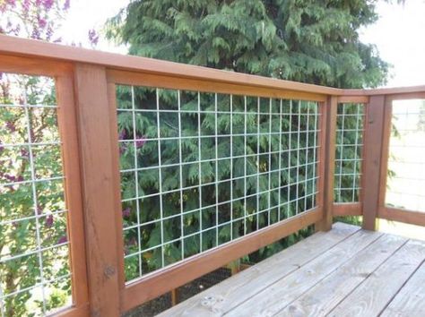 If your favorite outdoor space is your deck, we give you over 30 inspiring Deck Railing Ideas to show how you can spruce it up, from DIY to store bought. Wire Fence Panels, Wire Deck Railing, Deck Rails, Easy Deck, Deck Railing Ideas, Laying Decking, Deck Railing Design, Wooden Deck, Railing Ideas