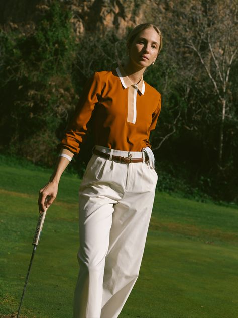 At last, a golf trouser that screams sophistication and wears perfectly. The wide leg pant features tonal tuxedo stripes and a 3" hidden hem. The 4-way stretch fabric is comfortable, wrinkle resistant and repels both water and stains. To top it off, we added sublte details like the hidden belt loop tee holders and complete stretch waist band that doesn't have that elastic appearance.A Note From Ali: This pant. It's been one I've dreamt of designing from the beginning. Bringing back a golf trouse Cute Golf Outfit, Summer Golf, Womens Golf Fashion, Golf Wear, Golf Apparel, Golf Outfits Women, Knit Blazer, Golf Fashion, Wide Leg Pant