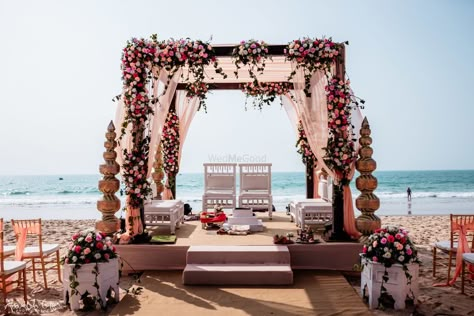 Photo of A floral mandap setup by the sea side Indian Wedding Beach, Mandap Setup, Destination Wedding Aesthetic, Indian Beach Wedding, Floral Mandap, Beach Wedding Theme, Hindu Wedding Decorations, Indian Wedding Decorations Receptions, Mandap Design