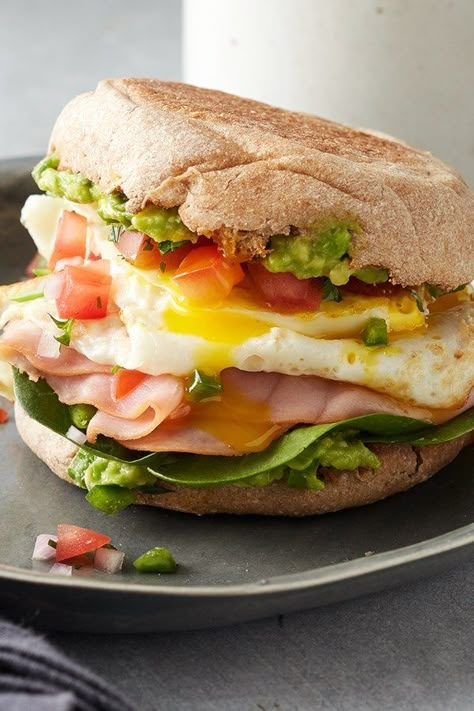 Packed with protein and lower in carbs, these ham and egg breakfast sandwiches with guacamole will keep you full all day. #breakfast #healthybreakfast #breakfastideas #brunchideas #healthybreakfastrecipes #breakfastideas #brunchideas #recipe #eatingwell #healthy Easy Breakfast For Dinner, Egg Breakfast Sandwiches, Croissant Breakfast Sandwiches, Breakfast For Dinner Ideas, All Day Breakfast, Breakfast Sandwich Recipes, Croissant Breakfast, Sandwich Bar, Breakfast Burger