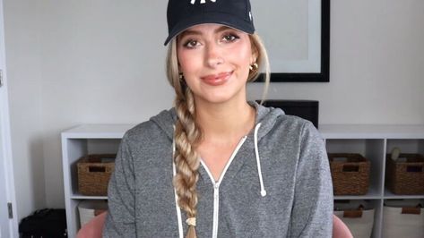 This is a guide to wearing a baseball cap with braids. Learn how to create four different side braids with a baseball cap using this easy step-by-step hair tutorial. Braids For Hats Baseball Caps, Side Braid With Baseball Hat, Braids With Baseball Cap, Ball Cap Hairstyles Long, How To Wear A Ball Cap Women Hair Style, How To Wear A Baseball Hat Women, How To Wear Baseball Caps Women, Ball Cap Hairstyles, Hairstyles To Wear With A Hat