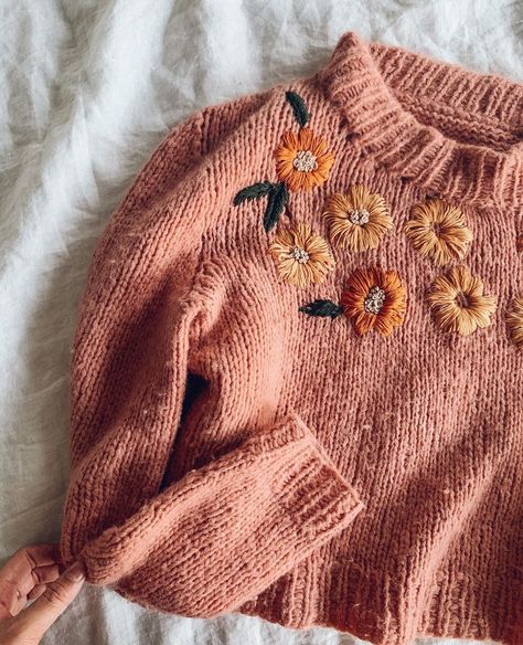 @plystreknitwear is adding summer to her winter jumper by hand embroidering it with orange DMC floss to make stunning florals. Embroidered Knitwear, Diy Clothes Rack Cheap, Jumper Embroidery, Diy Clothes Rack, Fiber Necklace, Diy Clothes Refashion, Embroidery Sweater, Wool Embroidery, Diy Clothes Life Hacks