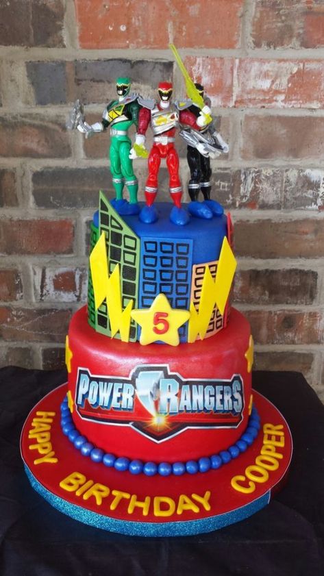 These 13 Power Rangers Party Ideas will kick your superhero party into high gear. Get ideas for cakes, favors, desserts, invites, and more! Power Rangers Ninja Steel Cake, Power Rangers Birthday Party Ideas Cake, Power Rangers Cake Ideas, Power Rangers Cakes For Boys, Power Ranger Birthday Cake, Power Ranger Party Ideas, Power Rangers Birthday Party Ideas, Power Rangers Birthday Cake, Power Rangers Cake