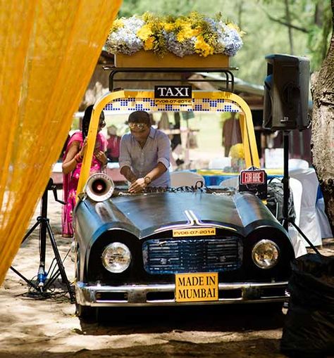 A 'Mumbai Bazaar' theme for the Mehendi of Freya Parekh and Vishal Ramchandani #weddingsutra #indianweddings #mandap #decorideas #florals #weddingflorals #drapes #weddingdecor #floralmandap #indianbride #indiangroom #weddingplanning #intimateweddings #outdoorweddings #colourful #streamers #decor #flowers #lights Mumbai Theme Decor, Unique Ideas For Wedding, Nautical Photo Booth, Instagram Booth, Wedding Photo Booths, Mumbai Local, Mad Hatter Party, Colorful Umbrellas, Wedding Backdrop Decorations