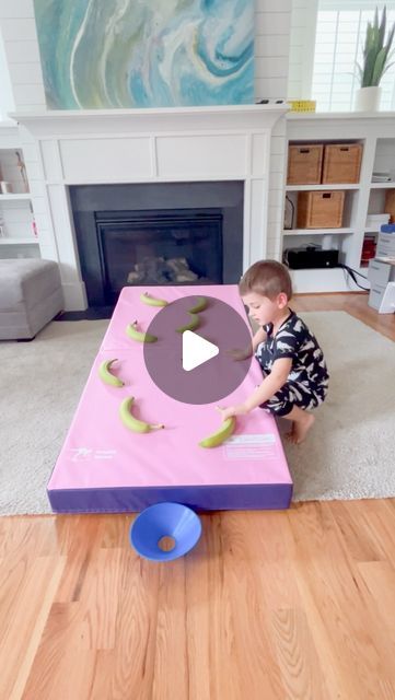 Lindsey BenGera | Sprinkle in Learning® on Instagram: "Banana Challenge 🍌

Bananas not quite ripe yet? Give this fun trial and error activity a try.  It was fun watching my sons ‘wheels’ turn as he planned each move to finally get the ball in the cup. 

We used our incline mat from @kangaroohoppers.offical. It worked like a charm, but you can use any ramp-like surface. 

#ad #sponsored #kangaroohoppers #inclinemat #bananas #banana #trialanderror #activitiesforkids #activityforkids #kidsactivity #kidsactivities #simpleplay #playtime #simpleplayideas #easyplay #indoorplay #indoorplayideas #preschoolgames #preschoolactivities #prek #stickwithit #momlife #timetoplay #funchallenge #challengeforkids #toddleractivity #homeschool #homeschoolmom" Banana Activities For Kids, Banana Activity, Banana Games, Trial And Error, My Sons, Preschool Games, Indoor Play, Diy Games, Fun Challenges