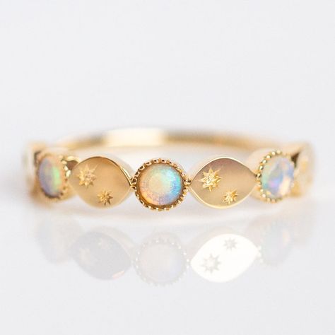 As glimmering as the night sky, this gorgeous ring features Australian opal and solid gold moons. Shop more unique opal pieces at Local Eclectic. Opal Diamond Engagement Ring, Moon Star Ring, 14k Gold Opal Ring, Opal Band Ring, Gold Opal Ring, Unique Opal, Natural Opal Ring, Local Eclectic, Moon And Star Ring