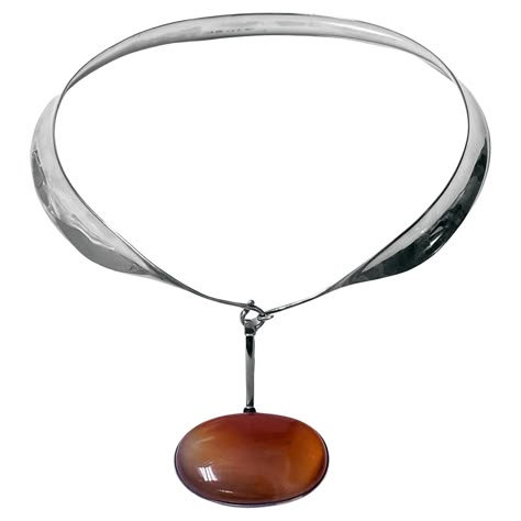 Vivianna Torun Bulow Hube for George Jensen, a rare Sterling Silver Necklace with reddish brown banded agate detachable pendant on collar, Denmark, C. 1975, stamped Georg Jensen in a dotted oval, Denmark, Torun, 133 pendant and 160 collar and 925S. Will fit up to 16 inch neck, pendant drop approximately 2.75 inches, width of agate 2 inches. Item Weight: 123 grams. Ref: The Jewellery Box Jens Ingvordsen P.275. Vivianna Torun Bülow-Hube know as Torun, was born 1927 in Malmo, Sweden. Torun was the Red Agate Necklace, George Jensen, Neck Pendant, Detachable Pendant, Dope Jewelry Accessories, Billie Holiday, Malmo, Dope Jewelry, Banded Agate