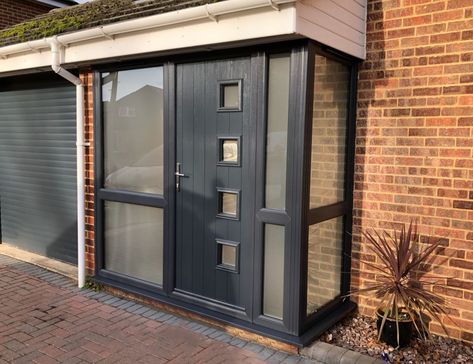 This is such a transformation to this home in Kent.  The Milano Solidor is shown here with a matching Anthracite Grey uPVC porch. Aluminium Porch Ideas, Grey Upvc Windows, Upvc Porch Makeover, Flat Roof Porch Ideas, Upvc Porch Ideas, Flat Roof Porch, Flat Roof Porch Entrance, Modern Porch Ideas Entrance, Porch Ideas Entrance