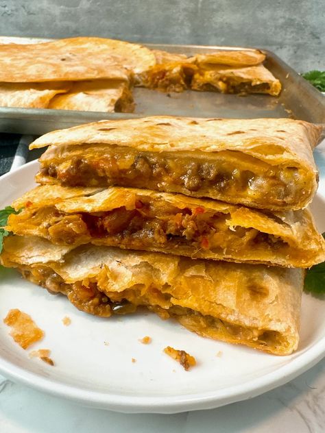 Sheet Pan Quesadillas. #sponsored. These incredible, budget-friendly quesadillas feature toasty tortillas stuffed with seasoned @lauraslean 92% Lean/8% Fat Ground Beef, tender beans, spicy salsa, and plenty of gooey cheese! And since they’re baked on a sheet pan (as one massive quesadilla), preparation is easy, cleanup is a breeze, and serving a crowd becomes infinitely more fun! #LaurasLean #1naturalbeef #allnatural #betterforyou Beef And Bean Quesadillas, Cheese Burger Quesadilla, Sheet Pan Quesadillas, Spicy Salsa, Celebrity Chef, Gooey Cheese, Meal Kit, Latest Recipe, Celebrity Chefs