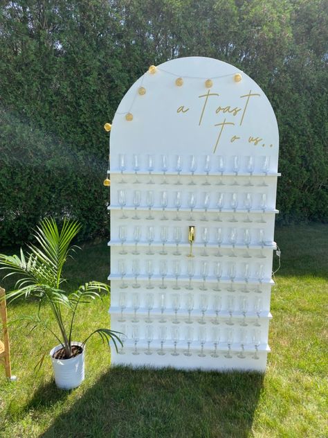 Bridal Shower Ideas Champagne Wall, Build A Champagne Wall, Champagne Wall Engagement Party, Boho Champagne Wall, Bridal Shower Champagne Wall, White Champagne Wall, Champagne Wall Diy, Diy Champagne Wall, Champagne Wall Wedding