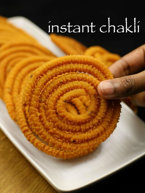 instant chakli recipe | instant chakkuli recipe | instant murukku recipe with step by step photo and video recipe. chakli are also called as chakuli / chakri/ chakkuli / jantikalu / muruku / chakali / chakri / chakralu in india. Chakli Recipe, Murukku Recipe, Desi Street Food, Diwali Snacks, Diwali Food, Vegetarian Snacks Recipes, Gujarati Recipes, Tea Time Snacks, Vegetarian Snacks