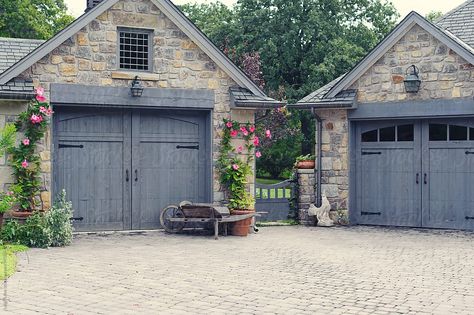 English Cottage Garage Doors With Gate Between Download this high-resolution stock photo by Leigh Love from Stocksy United. Cottage Garage Doors, Cottage Garage, Carriage House Garage, Best Exterior Paint, Garage Door Types, Home Styles Exterior, Garage Exterior, Carriage Doors, Garage Door Makeover