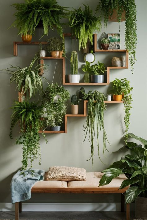 Elevate your decor with a living plant wall featuring staggered shelves and lush greenery. Combine ferns, cacti, and hanging plants for a unique, boho-inspired vibe. #LivingWall #BohoGreenery #PlantWallDecor #IndoorPlants #WoodenShelves #BohemianStyle #HomeDecorInspo #GreenLivingSpaces #FernsAndCacti #EcoFriendlyDesign Hanging Plants Shelves, Indoor Wall Decor Ideas, Walk Plants Decor, Plant Aesthetic Interior Design, Plant Decor Living Room Wall Shelves, Plant Wall Indoor Shelves, Living Room Hanging Plants Decor, Flower Shelf Wall, Plant Tv Wall Ideas Indoor