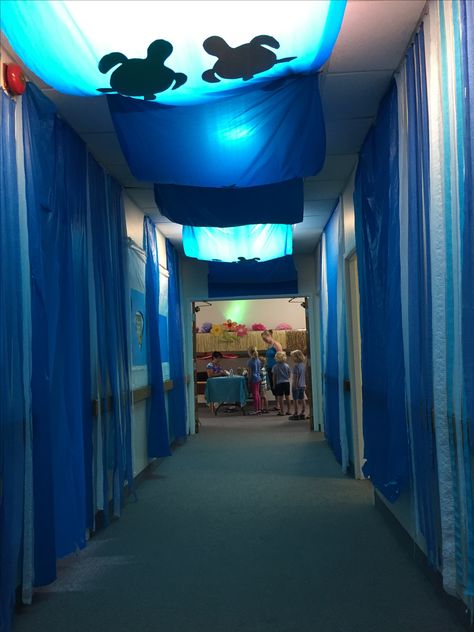 Decorations - Underwater Hallway Underwater Hallway, Decorating Hallways, Ocean Vbs, Scuba Vbs, Mystery Island, Adult Game Night, Vbs Decorations, School Hallway, Stage Ideas