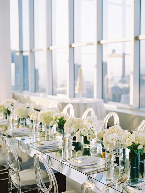 An All White Wedding with Skyline Views at South Park | White wedding reception mirrored table Mirrored Table Decor, White Wedding Reception, Simple Wedding Reception, Mirrored Table, White Weddings Reception, Dream Wedding Reception, Beautiful Wedding Reception, Wedding Mirror, All White Wedding