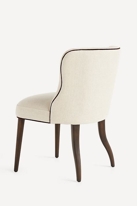 Valencia Linen Upholstery: 50% Viscose, 22% Linen, 16% Polyester, 12% Cotton Cushion fill: Foam & fiber Corner block frame Mortise & tenon leg construction Professional clean Imported | Meryl Dining Chair by Anthropologie in Beige, Women's Traditional Dining Chairs Upholstered, End Dining Chairs Different, Cream Upholstered Dining Chairs, Aesthetic Advice, French Country Dining Chairs, Cheap Dining Chairs, Wingback Dining Chair, Styling Services, Transitional Dining Chairs