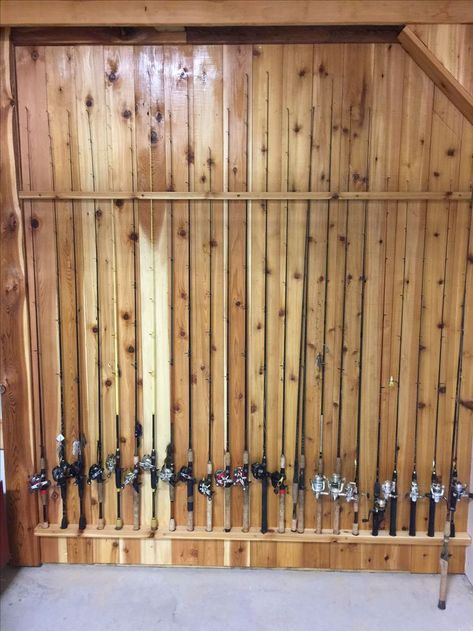 Cedar fishing pole rack Rod Holders For Garage, Fishing Gear Organization, Fishing Pole Rack, Fishing Pole Storage, Fishing Rod Holders, Ice Fishing Gear, Garage Ceiling, Fishing Storage, Fishing Rod Storage