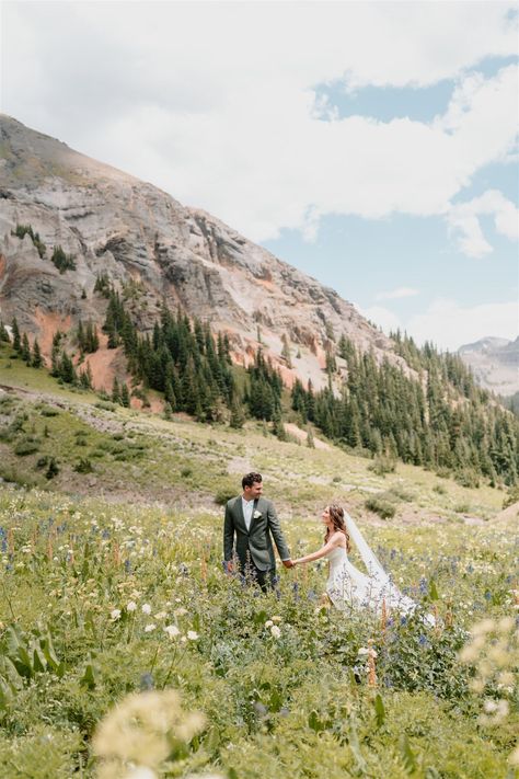 Colorado Mountain Micro Wedding Ceremony // As a mountain town local, I consider it a privilege to assist couples, especially those coming from out of state, in navigating through the plethora of exceptional details that perfectly align with their style, budget, and overall requirements. Come see more micro wedding reception, spring wedding venues, wedding flowers bouquet, and wildflower wedding ideas. Book me for your Colorado micro wedding photos or Colorado elopement at bywhitneyrae.com! Wedding Arch Mountains, Colorado Wedding Colors, Ouray Colorado Elopement, Colorado Elopement Ideas, Colorado Micro Wedding, Mountain Wedding Bouquet, Spring Wedding Venues, Spring Wedding Palette, Mountain Micro Wedding