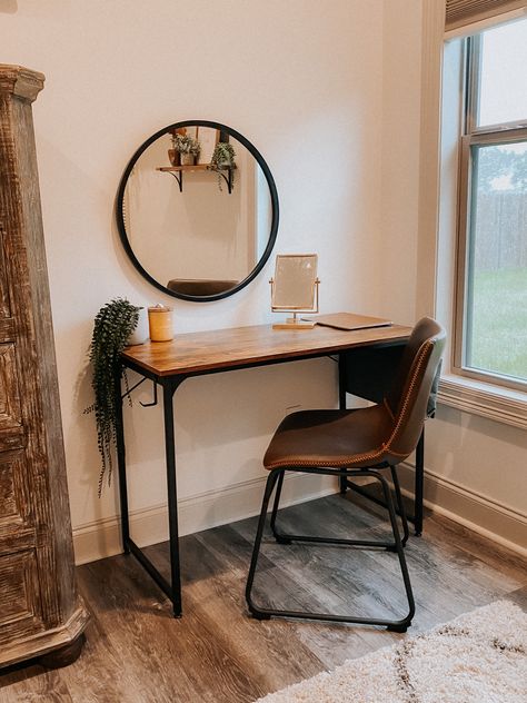 Earthy vanity with circle mirror and brown leather chair. Chair, Wooden Desk, and Circle Mirror from Amazon. Console With Circle Mirror, Brown Leather Desk Chair, Minimalist Vanity Ideas, Brown Vanity Bedroom, Vanity With Circle Mirror, Brown Desk Ideas, Bedroom Circle Mirror, Mirror Over Desk, Earthy Vanity