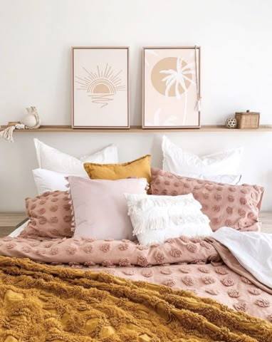 A serene and calming mustard and blush pink modern-boho bedroom.  The perfect way to layer cushions on your bed for a look that is stylish yet comfortable.  Cushions by seaTribe Australia.  #modernboho #modernbohobedroom #neutralbedroom #layeredcushions #bedcushionsaustralia Mustard Pillows Bedroom, Colourful Cushions On Bed, Bedroom Cushions Ideas, Pink And Mustard Boho Bedroom, Mustard Decor Bedroom, Blush And Mustard Bedroom, Pink Boho Bedding, Pink And Mustard Room, Boho Blush Pink Bedroom