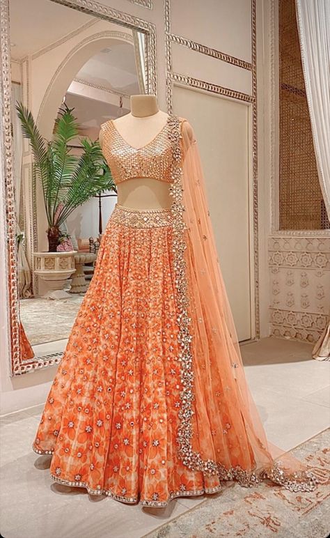 Braidel Lehnga, Pastel Orange Lehenga, Orange Color Lehenga, Bollywood Style Peach Lehenga For Festivals, Festive Bollywood Peach Choli, Orange Colour Lehenga, Mehndi Aesthetic, Abhinav Mishra, Designing Clothes